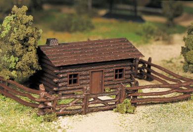 Log Cabin with Rustic Fence